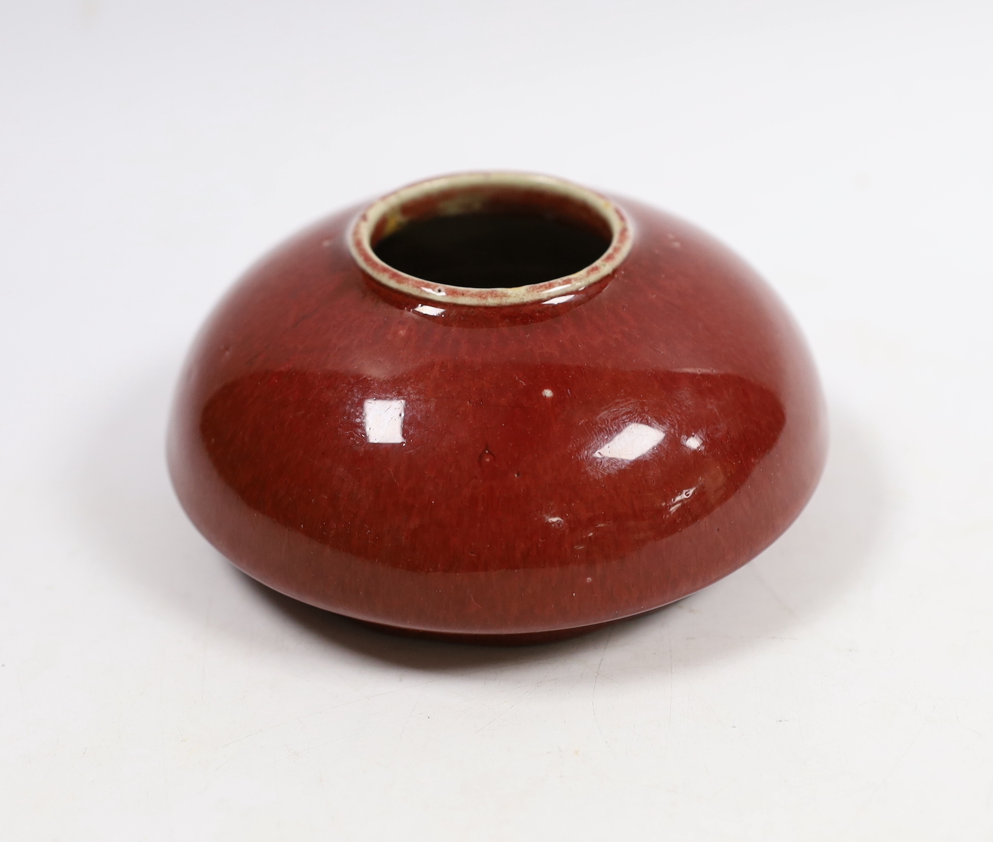 A Chinese sang de boeuf glazed water pot, 12cm diameter